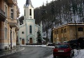 sbor Dr. Pavla Farského 1, Do r. 1946 evangelický kostel sv. Petra. V novorománském stylu. R. 1864 přistavěna věž a zahájena stavba sousední fary. Architekt J. Zeissig
